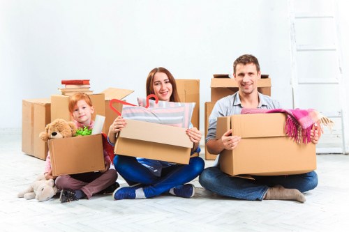 Professional moving team handling boxes and household items in Richmond upon Thames