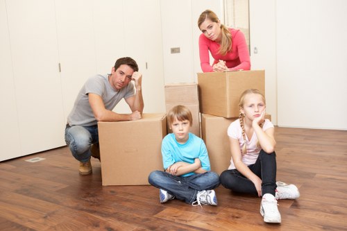 Packed household boxes and furniture prepared for removals in Richmond Upon Thames