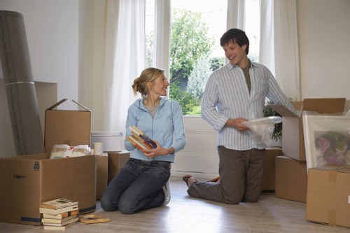 Professional movers handling furniture in a Richmond home