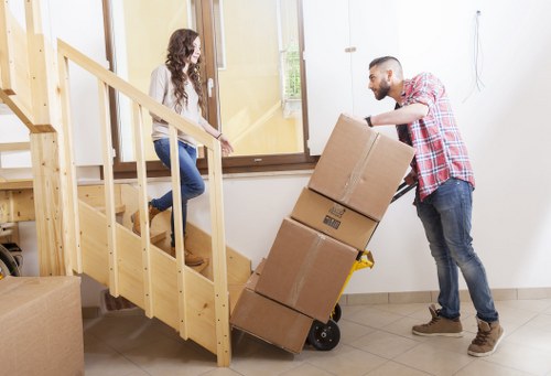 Packing and loading furniture into a removal van