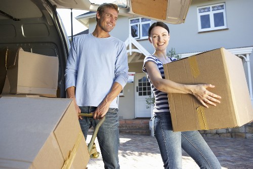 Professional van loading scene with secure packing and PPE