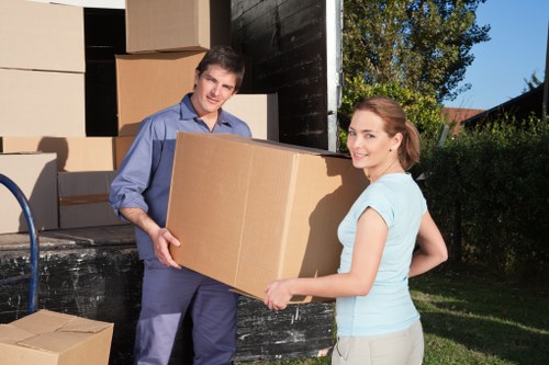 Office relocation equipment and labelled boxes during a commercial move in Richmond Upon Thames