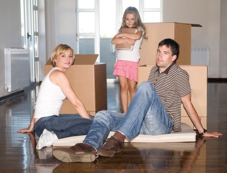 Packed boxes and furniture ready for a flat removal service in Richmond Upon Thames